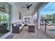 Relaxing patio with wicker furniture and view of pool and spa at 8839 Interlocking Ct, Davenport, FL 33896