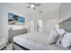 Main bedroom with king-size bed and ensuite bathroom at 8839 Interlocking Ct, Davenport, FL 33896