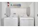 Bright laundry room with washer and dryer at 8839 Interlocking Ct, Davenport, FL 33896