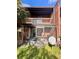 Spacious screened-in patio with brick flooring and access to the backyard at 5150 Picadilly Circus Ct # 7, Orlando, FL 32839