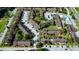 Aerial view of a large townhome community with pool and parking at 5150 Picadilly Circus Ct # 7, Orlando, FL 32839