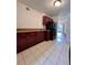Spacious kitchen with dark wood cabinets and stainless steel appliances at 5150 Picadilly Circus Ct # 7, Orlando, FL 32839