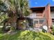 Spacious screened-in patio with brick flooring and access to the backyard at 5150 Picadilly Circus Ct # 7, Orlando, FL 32839