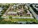 Aerial view of townhouses community, pool, and parking at 5150 Picadilly Circus Ct # 7, Orlando, FL 32839
