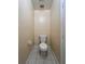 Small bathroom with toilet and tiled floor at 5150 Picadilly Circus Ct # 7, Orlando, FL 32839