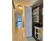 Hallway with tiled floors, AC unit, and water heater at 5150 Picadilly Circus Ct # 7, Orlando, FL 32839