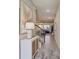 Bright and airy entryway with a stylish console table and view to the living room at 1842 Tropical Palms Cir, Kissimmee, FL 34747
