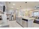 Modern kitchen with gray cabinets, stainless steel appliances, and an island at 1842 Tropical Palms Cir, Kissimmee, FL 34747