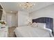 Elegant bedroom with a king-size bed and en-suite closet at 1842 Tropical Palms Cir, Kissimmee, FL 34747