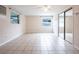 Spacious bedroom with tile floors and large windows at 1721 Bellgrove St, Lakeland, FL 33805