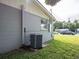 House exterior with AC unit and partial view of street at 1721 Bellgrove St, Lakeland, FL 33805