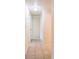 Clean hallway with tile floors and access to bedrooms and bathroom at 1721 Bellgrove St, Lakeland, FL 33805