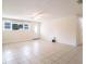 Bright and airy living room with tile floors at 1721 Bellgrove St, Lakeland, FL 33805