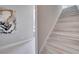 Modern staircase with light wood risers and treads at 7770 Sandy Ridge Dr # 201, Reunion, FL 34747