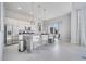 Modern kitchen featuring stainless steel appliances and breakfast bar at 7770 Sandy Ridge Dr # 201, Reunion, FL 34747