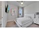Bedroom with a queen-size bed and a wall-mounted TV at 7770 Sandy Ridge Dr # 201, Reunion, FL 34747