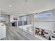 Open loft showcasing a view of the kitchen and living spaces below at 7770 Sandy Ridge Dr # 201, Reunion, FL 34747