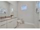 Modern powder room with a single vanity and toilet at 7770 Sandy Ridge Dr # 201, Reunion, FL 34747