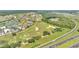 Aerial view of Reunion community golf course and highway at 7770 Sandy Ridge Dr # 201, Reunion, FL 34747