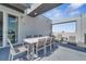 Relaxing balcony with outdoor furniture, perfect for dining or lounging at 7770 Sandy Ridge Dr # 201, Reunion, FL 34747