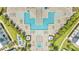 Resort-style pool with surrounding lounge chairs and landscaping at 7770 Sandy Ridge Dr # 201, Reunion, FL 34747