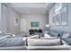 Spacious living area with comfortable seating and a large TV at 7770 Sandy Ridge Dr # 201, Reunion, FL 34747