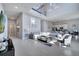 Spacious living room with high ceilings and modern furniture at 7770 Sandy Ridge Dr # 201, Reunion, FL 34747