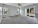 Bright living room with sliding door to deck access at 526 Maricopa Dr, Kissimmee, FL 34758