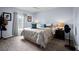 Spacious primary bedroom with ample natural light and room for a king-size bed at 526 Maricopa Dr, Kissimmee, FL 34758