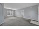 Bright dining area with neutral carpeting and large window providing natural light at 526 Maricopa Dr, Kissimmee, FL 34758
