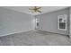 Spacious bedroom with carpet flooring and ceiling fan at 526 Maricopa Dr, Kissimmee, FL 34758