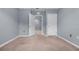 Spacious bedroom with neutral walls and carpet at 816 William Way, Haines City, FL 33844