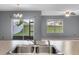 Kitchen with stainless steel sink and view of backyard at 816 William Way, Haines City, FL 33844