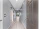 Bright and airy entryway with tile flooring and neutral walls at 816 William Way, Haines City, FL 33844