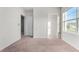 Bright bedroom with large window and walk-in closet at 816 William Way, Haines City, FL 33844