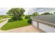 Attached two-car garage with a spacious driveway at 1380 E Lake Shore Blvd, Kissimmee, FL 34744