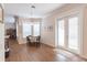 Breakfast nook with wood floors and French doors leading to deck at 1380 E Lake Shore Blvd, Kissimmee, FL 34744
