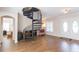 Grand entryway showcasing a spiral staircase and hardwood floors at 1380 E Lake Shore Blvd, Kissimmee, FL 34744