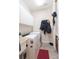 Laundry room with washer, dryer, and overhead cabinets at 1380 E Lake Shore Blvd, Kissimmee, FL 34744