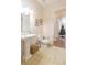 Clean bathroom with pedestal sink and tiled flooring at 1380 E Lake Shore Blvd, Kissimmee, FL 34744