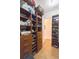 Walk-in closet with custom shelving and drawers at 1380 E Lake Shore Blvd, Kissimmee, FL 34744