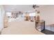 Spacious bonus room with carpeted floor, ceiling fan, and built-in shelving at 1380 E Lake Shore Blvd, Kissimmee, FL 34744