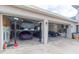 Large garage with car lift and ample storage space at 1380 E Lake Shore Blvd, Kissimmee, FL 34744