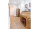 Hallway with wood floors and vintage roll top desk at 1380 E Lake Shore Blvd, Kissimmee, FL 34744