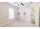 Spacious bedroom with neutral walls and ceiling fan at 1380 E Lake Shore Blvd, Kissimmee, FL 34744