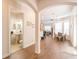 Bright dining area with wood floors and view into adjacent living room at 1380 E Lake Shore Blvd, Kissimmee, FL 34744