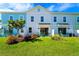 Private backyard with patio and lush landscaping at 2980 On The Rocks Pt, Kissimmee, FL 34747