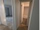 Hallway with doors leading to bedroom and bathroom at 2912 S Semoran Blvd # 9, Orlando, FL 32822