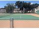 View of tennis courts from behind fence at 2912 S Semoran Blvd # 9, Orlando, FL 32822