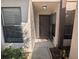 Condo building exterior with walkway and landscaping at 2912 S Semoran Blvd # 9, Orlando, FL 32822